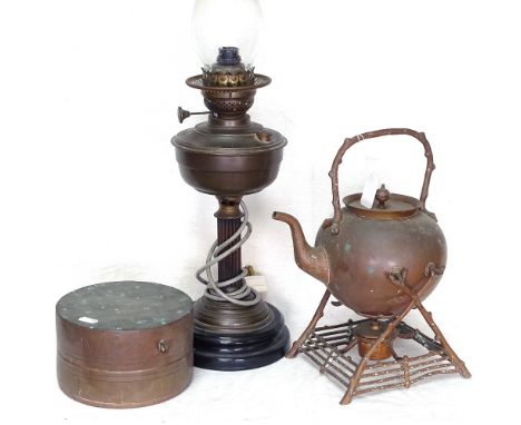 A copper kettle on stand, a brass oil lamp, and a Chinese cylindrical copper box, diameter 18cm (3) 