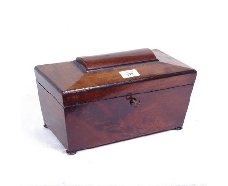 A Victorian mahogany dome-top rectangular tea caddy, with interior lids and bun feet, caddy length 30cm 