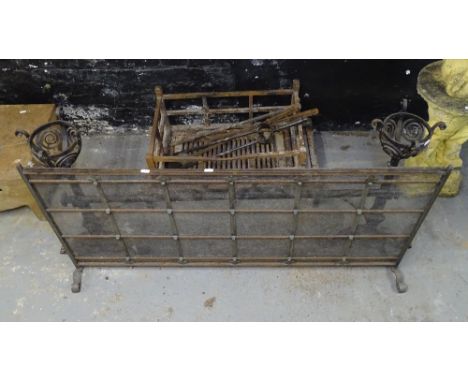 A Victorian cast-iron duck's nest fire grate, together with a pair of candle fire dogs, mesh fire guard, and set of companion