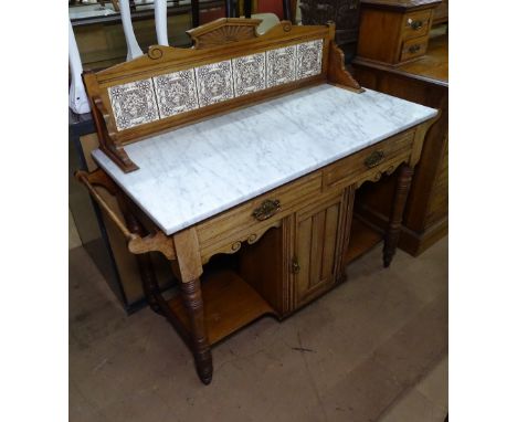 An Edwardian mahogany washstand, with raised tile and marble-top, 2 frieze drawers, cupboards under, with ring turned legs, b