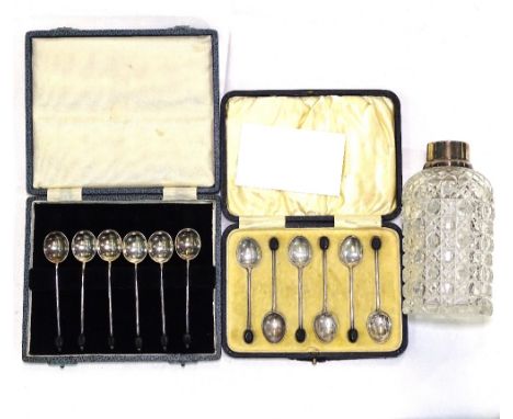 2 cased sets of silver bean-end coffee spoons, and a cut-glass and silver-mounted decanter 