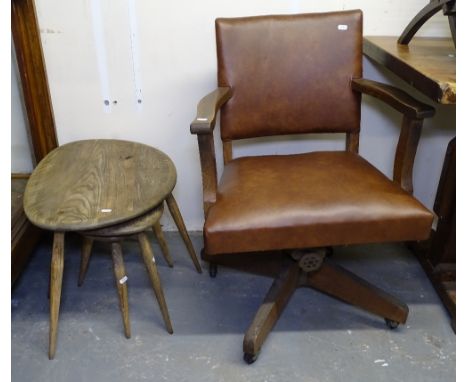 A 1920s swivel desk chair, and a graduated pair of Ercol Pebble coffee tables 