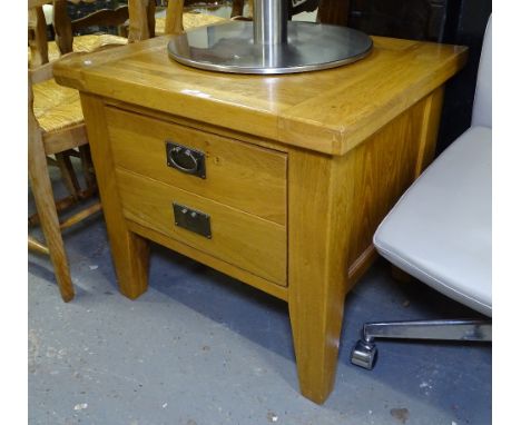 A modern oak lamp table with single drawer, W68cm, H63cm 