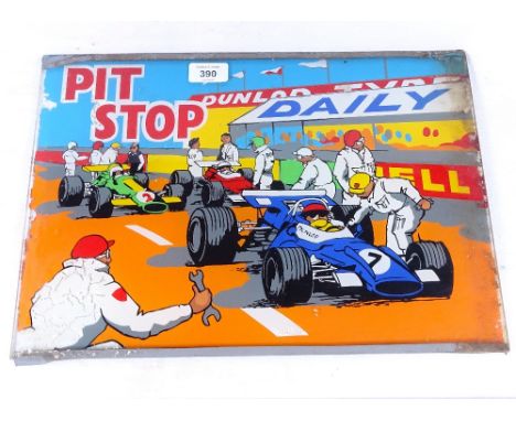 A painted glass Pitstop sign advertising Dunlop, length 41cm 
