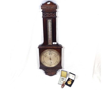 An oak-cased barometer and thermometer, height 83cm, and 2 ladies wristwatches and a nurses watch 