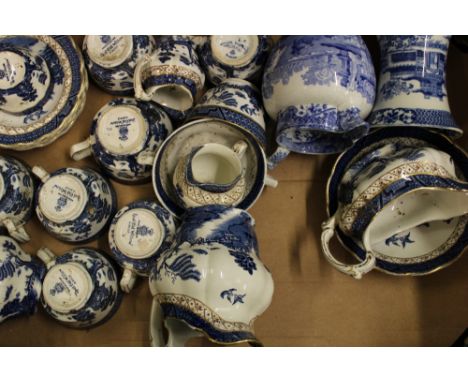 Booths Real Old Willow tea ware and jugs: Spode Italian jug, Blue Willow vase etc (1 tray). 