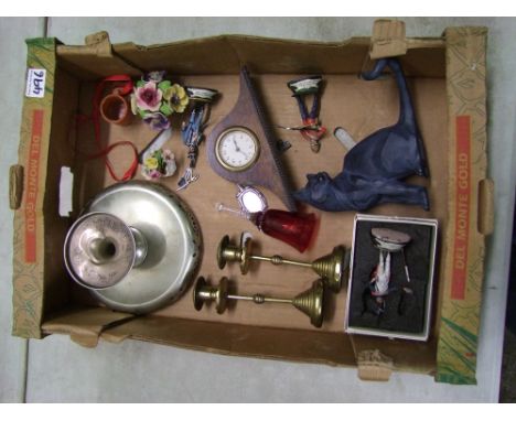 A mixed collection of items to include: brass candlestick holders, small oak cased mantel clock, stylised cat figure, lead so