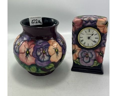 Moorcroft Pansy vase: (crack to top rim) together with a mantle clock. Height of vase 15cm. Both seconds 