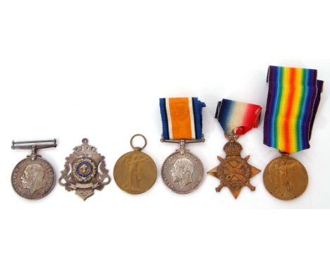 Presumed family group of Great War medals comprising three No 47806 Pte J S Lambert of the Suffolk Regiment 1914-15 Star, Bri