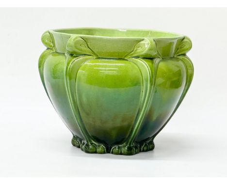 Bretby Pottery. An Art Nouveau glazed earthenware jardiniere. Late 19th Century. 31x22cm.