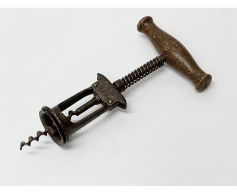 A German spring assistant pinion corkscrew. Late 19th Century.