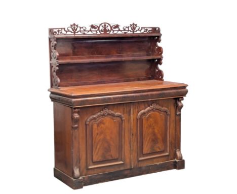 A mahogany chiffonier. C. 1850-1860. A 19th Century Victorian chiffonier with carved open fret gallery, and 2 ogee front draw