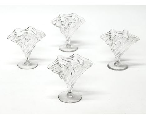A set of 4 Art Deco wrythen glass vases. Early/Mid 20th Century. With fan shaped bodies and crimped handkerchief rims. 11x6.5