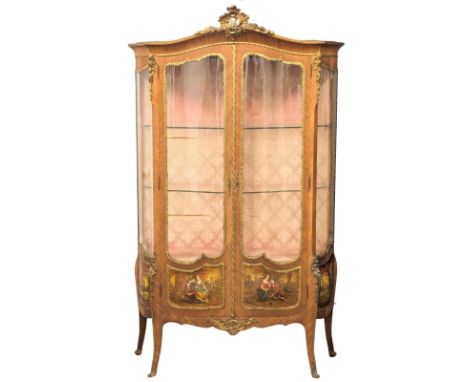 Henry Barker LTD. A large good quality Early 20th Century Louis XV style vitrine / display cabinet with brass ormolu mounts a