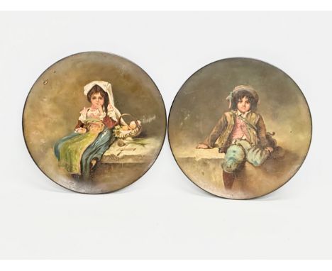 Watcombe Torquay. A pair of 19th Century hand painted pottery chargers. "Boy of Picinisco" and “Taking a Rest” 1870’s/1880’s.
