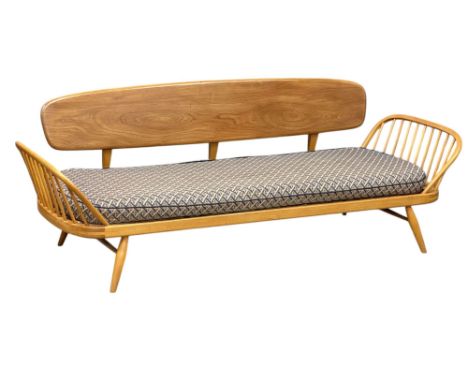 A Windsor blonde studio couch, by Ercol. C.1970. Mid Century. An elm and beech daybed. Model 355. 209cm