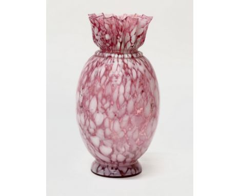 An opaline and cranberry glass vase. Late 19th Century. with flared handkerchief style rim and baluster form. 28cm.