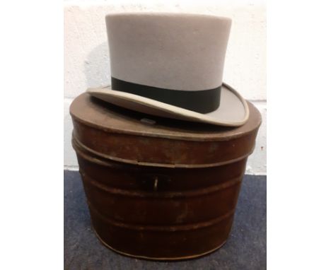 A vintage metal hat box and a Best Quality grey top hat with black band, approx 60cm internal circumference. Location:RWB 
