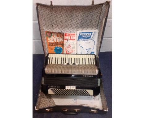 A Hohner Carena IIIM accordion with sheet music in travel case together with a vintage projector. Location:G 