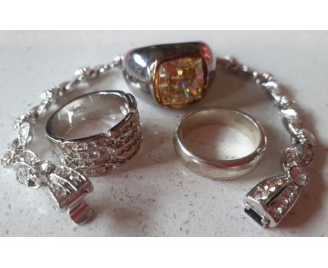 An Attwood &amp; Sawyer silver tone and white crystal bracelet together with a silver ring with faceted citrine coloured ston