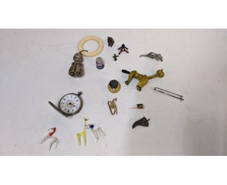 Collectables to include a silver half Hunter pocket watch, New Zealand badge, a babies rattle and cold cast bronze model anim