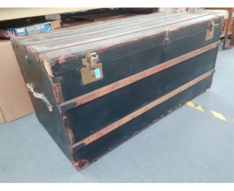 An early 20th Century black painted trunk. Location:A2M 