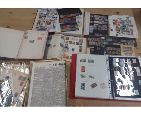 A vintage stamp collection containing worldwide stamps together with a 1953 reproduction newspaper. Location:1.4 