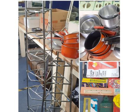 Vintage kitchenware to include Dandy aluminium saucepans with red handles, later Tower saucepans, 2 chrome saucepan towers, a