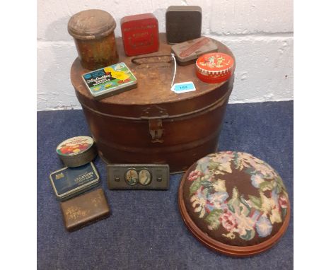 A Victorian tin hat box, a quantity of vintage tins, a vintage sewing box with contents and a tapestry topped footstool.Locat