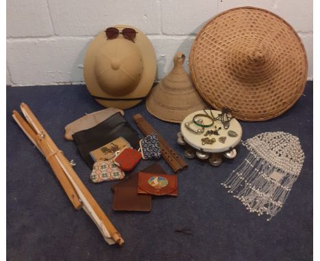 A mixed vintage lot comprising costume jewellery, hats, a tambourine and wooden flute, wallets, an embroidery frame and a rep