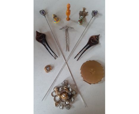A pair of silver extra long stem hat pins with Scottish thistle design having central purple stones together with a small qua