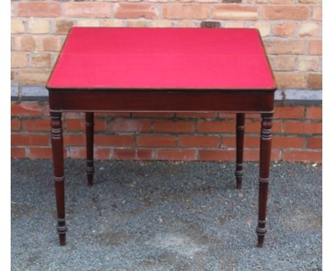 A 19TH CENTURY MAHOGANY FOLDOVER CARD TABLE having baize lining, supported on four turned legs 75cm x 91cm 