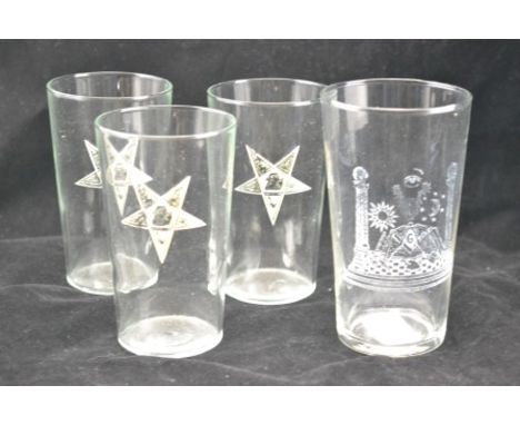 A SET OF THREE ENGRAVED MASONIC TUMBLERS, star motif with central beehive and working tools, together with one other TUMBLER 