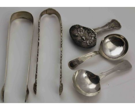 TWO PAIRS OF 18TH CENTURY SILVER SUGAR TONGS, one pair with bright cut decoration, together with THREE CADDY SPOONS, differen