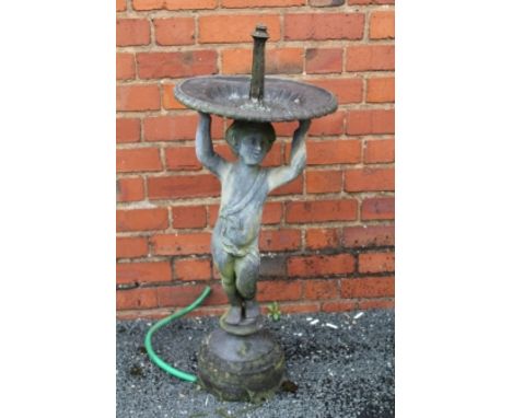 A CAST LEAD GARDEN FOUNTAIN in the form of a boy holding aloft a tray on beaded plinth base, 95cm (inclusive of spout) 