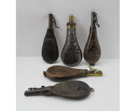 A VICTORIAN EMBOSSED LEATHER SHOT FLASK with hunting scene decoration, embossed "C &amp; JW Hawkesley, Sheffield", together w