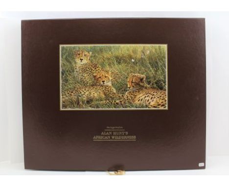 AFTER ALAN M. HUNT THE SAPPI PORTFOLIO, "AFRICAN WILDERNESS", contains limited edition, 221 of 995 pencil signed prints, in p