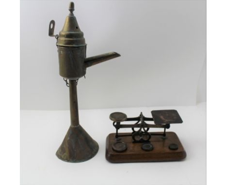 A WHALE OIL LAMP with hinged cover, wall hanging loop, also freestanding on conical base, 33cm high, together with a SET OF B