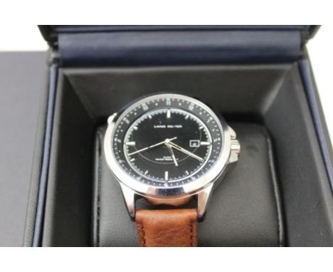 A "LAND ROVER" BRANDED GENTLEMAN'S WRISTWATCH, ebonised dial with baton markers, date aperture and revolving bezel on brown l