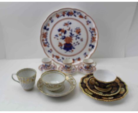 A ROYAL WORCESTER CERAMIC CAKE STAND, raised on circular foot, decorated in the Japonaise manner, 27cm diameter, together wit