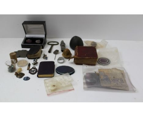 A COLLECTION OF MISCELLANEOUS ITEMS includes; an "Oslo 1947" tie pin, a whistle, miniature books, a tiny glazed ceramic jug 5