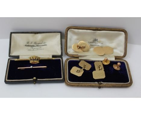 A PAIR OF RECTANGULAR 9CT GOLD CHAIN LINK CUFFLINKS, engine turned, together with a pair of 15CT PLAIN OVAL CUFFLINKS, a pair