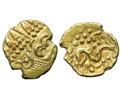 Corieltavi North East Coast gold stater c. 55BC - 45BC. Right type with pellet. Obv. Stylised head of Apollo right. Rev. Disa