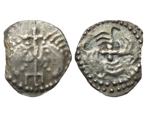 Anglo-Saxon sceat, series J type 37. York group. Secondary phase, 710-760 AD. Two diademed heads face to face, cross between.