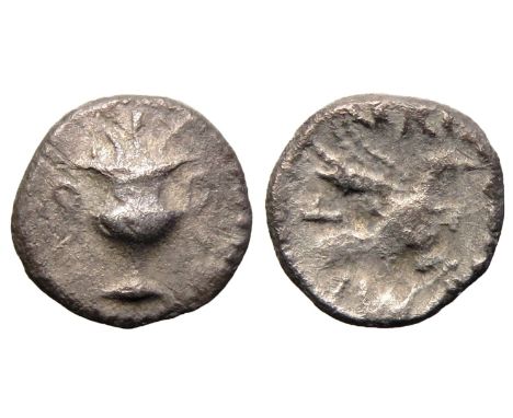 Regini and Artebates:Â&nbsp;Verica wine cup silver minim. Circa 10-40 AD. Wine cup, REX above. R. Eagle right, VERICA COMMI F