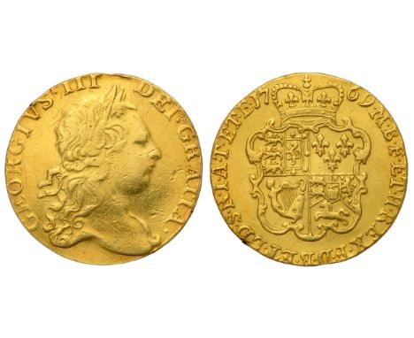 George III Guinea. 1769. Gold, 8.30g. 25mm. Third laureate bust right, GEORGIVS III DEI GRATIA. R. Crowned shield of arms, da