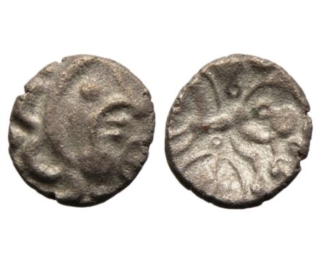 East Wiltshire. Circa 50 BC. Upavon moon head silver unit. 11mm, 0.85g. Moon head right, three crescents for hair, large chin