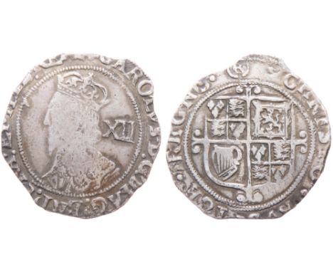 Charles I Shilling. Tower mint, London. Crowned bust left, XII mark of value behind. CAROLVS D G MAG BRI FRA ET HIB REX. R. S