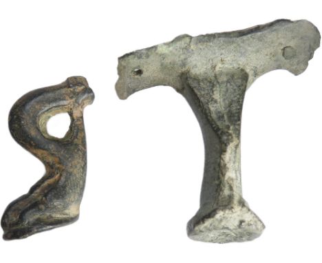 Large Roman Bronze casket or tripod feet (2). Circa 1st-3rd century CE. Both heavy cast pieces, one in the form of a lion's l