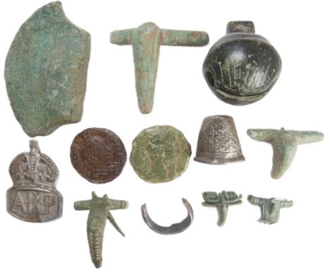 Coin and artefacts group (12). Circa 1500 BCE-20th century CE. To include, a Bronze Age axe blade, 5 x Roman brooch pieces, 2